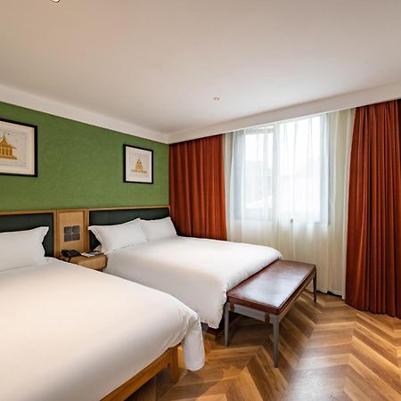 בייג'ינג Qiuguo Hutong Courtyard Hotel מראה חיצוני תמונה