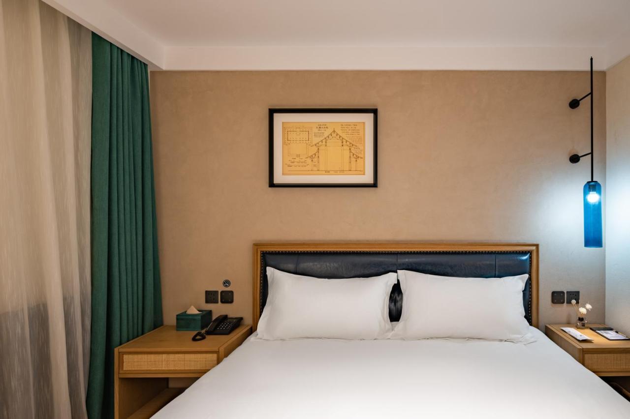 בייג'ינג Qiuguo Hutong Courtyard Hotel מראה חיצוני תמונה