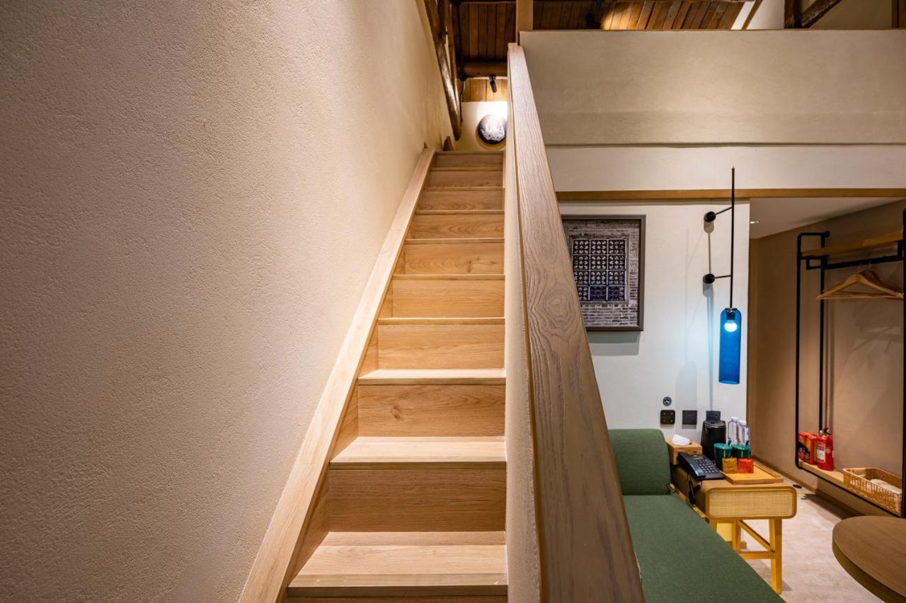 בייג'ינג Qiuguo Hutong Courtyard Hotel מראה חיצוני תמונה