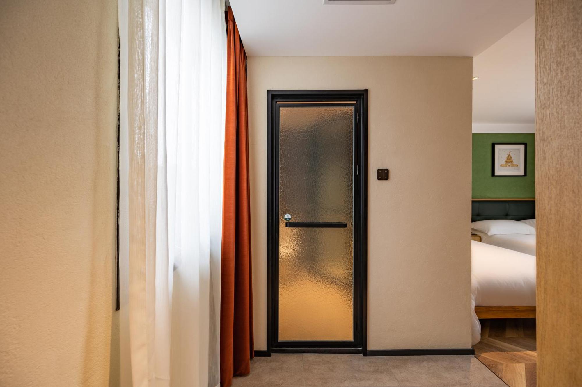 בייג'ינג Qiuguo Hutong Courtyard Hotel מראה חיצוני תמונה